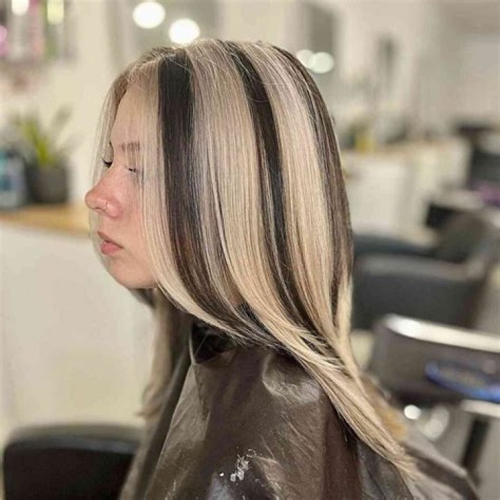 	A WHIFF OF FASHION: SKUNK-STRIPED HAIR	
