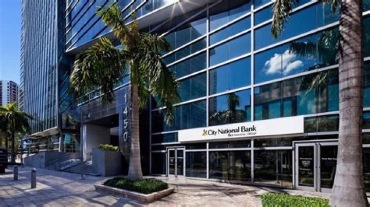 	Banco Popular EspaM-qol buys Miami’s TotalBank	
