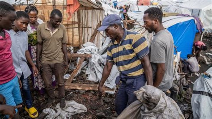 Bomb kills at least 12 people, including children, at displacement camps in eastern Congo