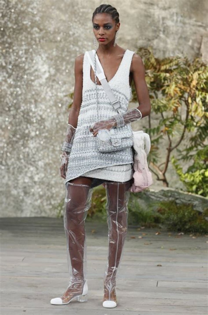 Chanel created a waterfall for its spring/summer 2018 collection, making raincoats and wellington boots chic again