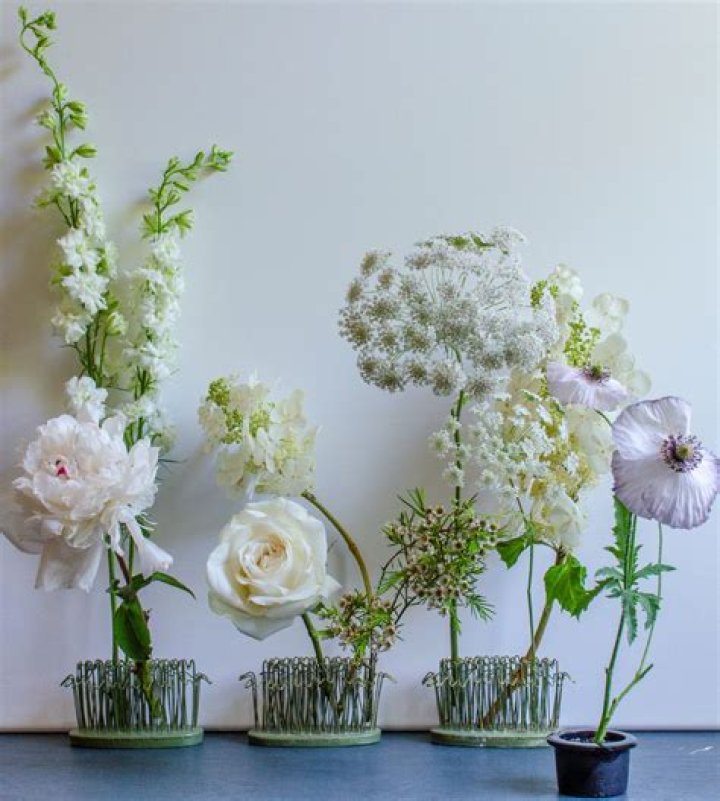 	EMILY WHALEY, 87, A FLORAL GENIUS	