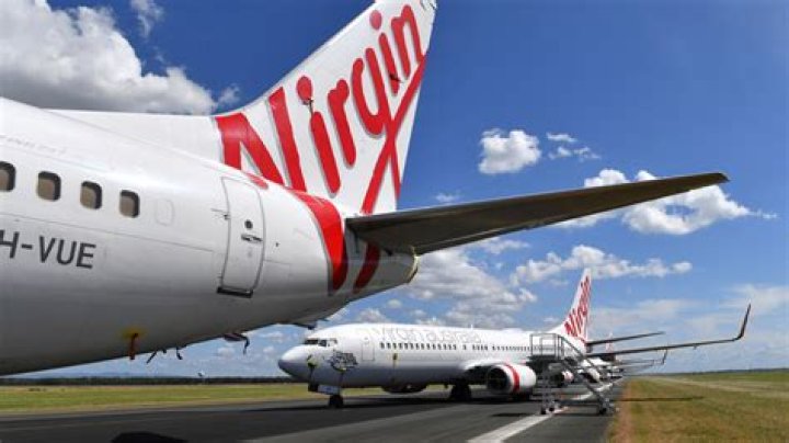 Naked man running through aisle forces plane to turn around mid-flight