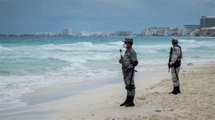 Shots fired at Cancun beach after gunmen arrive on jet skis, police say