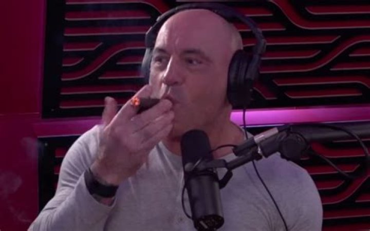 Which company's cigars does Joe Rogan smoke on his podcast?